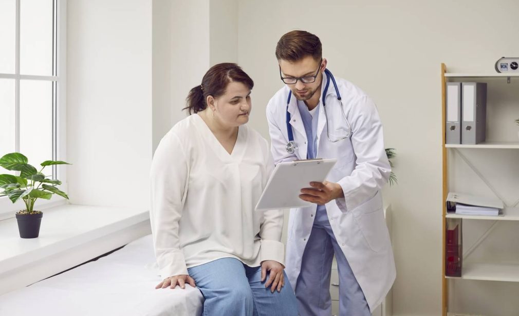 Doctor reviewing weight management and metabolic health plan