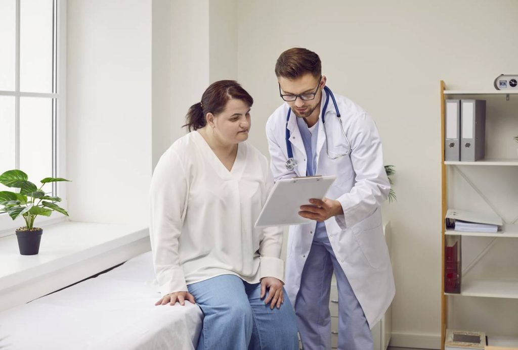 Doctor reviewing weight management and metabolic health plan