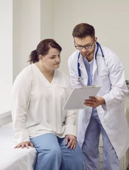 Doctor reviewing weight management and metabolic health plan