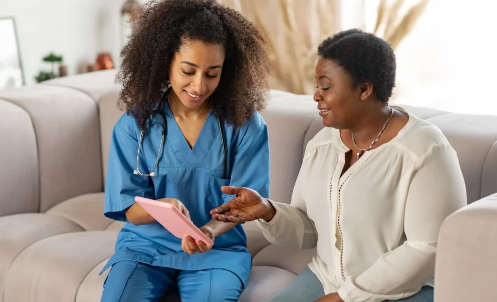 Women’s health exam and preventive care consultation in clinic